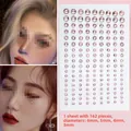 Pegatinas de strass rosa para la cara en tamaños mixtos para maquillaje de ojos de fiesta - 126 Piezas/Paquete (Tamaños Mixtos) / Rosa Claro