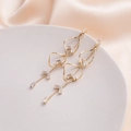 Elegant gold drop earrings with sparkling zircon tassels on a premium silk background - Gold Twisted Zirconia Tassel Earrings (E2722-1)