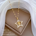 Detail of gold star pendant with zircon inlay and Virgin Mary relief on silk background - Gold Virgin Mary Star Style (F403)