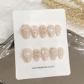 Handmade light pink cat eye press-on nails with pearl, rhinestone bows and heart charms - Extra Small (XS) / Pale Pink Cat Eye Style (1750 Short Round)