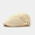 Detailed close-up of beige straw flat cap showing woven texture and adjustable metal buckle - Adjustable / Khaki