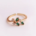 Detail of adjustable gold ring featuring green marquise stones and leaf design - Plant Leaf Green Marquise Zircon Style (JZ267-6)