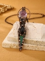 Detail of vintage bronze pendant necklace with purple amethyst and agate inlay - Green