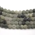 Makroaufnahme matter Natur-Grüner-Grasstein-Rundperlen mit einzigartigen Steintexturen - Matte Rundperle/4mm/ca. 90 Stk.