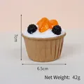 Artificial white cream cupcake model with blackberries and orange slices, 7cm height - Kraft Paper Orange