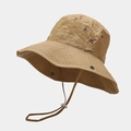 Detail of khaki wide brim sun hat showing breathable metal vents and adjustable chin strap - One Size / Khaki