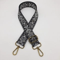 Adjustable wide embroidered bag strap with ethnic pattern and brass hardware on white background - Black Grey Bronze Hook