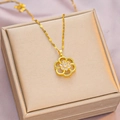 Elegant gold titanium steel necklace with a floral zircon pendant on a luxury gift box - 6046 Hollow Flower / Gold