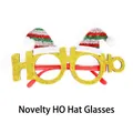 Glittery gold HoHo Christmas glasses with mini Santa hats and red frame for holiday party - Gold HO HO HO Glasses with Hat