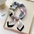 Silk-like square scarf with pink and green geometric waves and a black border detail - Beige Wave Belt