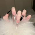 Long almond press-on nails with black French tips, white dots and rhinestone accents - By2247 Is Similar In Nature. / Glue Type
