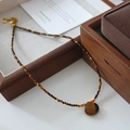 Tiger eye beaded necklace featuring golden accents and heart-shaped natural stone pendant - Tiger Eye Necklace XL0278