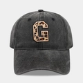 Detail of vintage washed black cotton baseball cap with leopard print letter G embroidery - Letter G