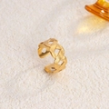 Adjustable 18K gold-plated titanium steel ring featuring a braided hollow geometric design - Intertwined Hollow / Gold