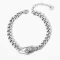 Silver stainless steel Cuban chain bracelet with a green-eyed snake head clasp - Silver