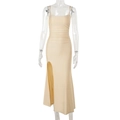 Detail view of apricot maxi dress featuring side slit and delicate pleated waist fabric - XS / Champagne