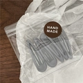 Set of 5 grey drip oil teardrop hair clips in handmade packaging on wood background - 5 Pieces / Gray