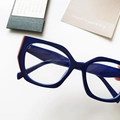 Modern deep blue geometric cat-eye glasses frame with stylish dark red temple accents - Royal Blue