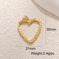 Golden heart pendant size 30x21mm and 2.4g weight on beige textured background - Heart Shape