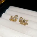 Orecchini a perno a forma di cavallo a dondolo in oro con zirconi brillanti - Oro (Perno in Argento S925)