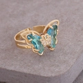 Macro shot of 18K gold butterfly ring with gradient blue crystals and zircon details - Adjustable Open / Lake Blue