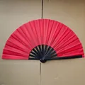 Traditional red folding fan with glossy black bamboo ribs and durable cloth surface - Solid Red Style (A16)