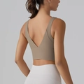 Macro view of khaki sports bra with deep V-back design and wide supportive elastic band - Cocoa