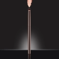 Rose gold makeup brush with soft bristles dipping into pink cosmetic powder - Blending Brush