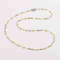 Elegant silver-tone chain necklace featuring vibrant yellow enamel beads and lobster clasp - Steel + Yellow Enamel