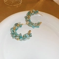 Detail of C-shaped hoop earrings with blue stones and gold beads on white ceramic tray - Aquamarine Chips Gold Style (S925 Silver Pin)