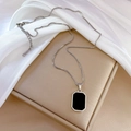 Macro shot of silver box chain and rectangular pendant with black inlay on silk cloth - M508 Silver (Full Titanium Steel) / Silver