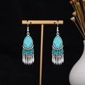 Detailed shot of ethnic boho silver teardrop earrings with turquoise beads and tassels - Silver Turquoise Green Spiky Tassel(E7275)