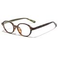 Retro round tortoise shell eyeglasses frames with metal rivets on a white background - Tortoise