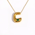 Detail of 18k gold plated bubble letter C pendant with a green heart-shaped gemstone - Letter C