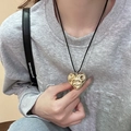 Golden irregular heart pendant necklace with lava texture on minimalist black cord - Gold Wrinkled Heart with Black Cord