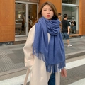 Close-up of blue winter scarf featuring soft wool texture and elegant tassel details - 300g Wool Blend Style / Denim Blue