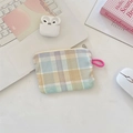 Detail of colorful plaid fabric storage pouch with pink handle on office desk - Large Plaid Stripe Khaki