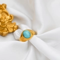 Detailed view of vintage 18k gold plated ring with green turquoise stone on silk - US 5 / Blue Turquoise