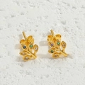 Golden branch stud earrings featuring colorful zircon leaf accents in a minimalist design - Leaf