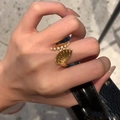 Golden fan-shaped open ring with pleated texture and micro-pave white crystals - Fan Shaped Pleat