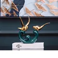 Modern ceramic love bird statue in dark green and gold finish for shelf decor - Love Birds Playful 9123
