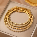 Set of four gold-plated chains including snake, paperclip, bead, and rope link bracelets - 4Pcs Set Bracelet / Gold