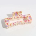 Detailed view of floral hollow hair claw clip with pink and purple ink flower patterns - Beige Floral