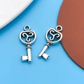 Set of 2 vintage silver heart key pendants with triskele pattern for DIY jewelry - 1pc Antique Silver Key 10x22mm