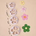Set of 4 white plastic flower cookie cutters in sizes 3.8cm to 5.7cm for fondant cake - Plum Blossom Cutter Set 4-Piece