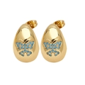 Detail of gold butterfly stud earrings with blue bead accents and polished finish - Turquoise Butterfly