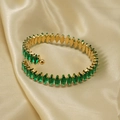 Adjustable golden open bangle with marquise-cut green cubic zirconia on silk - Emerald