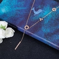 Y-shaped titanium necklace in rose gold finish with circle and bar geometric pendants - Rose Gold