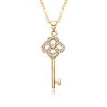 Macro shot of gold-plated heart key necklace with sparkling zircon clover details - Clover Full Rhinestone Key Style (c182)