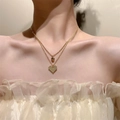 Double-layered gold necklace with smooth heart and sparkling rhinestone heart pendant - KC Gold Layered Heart (6451)